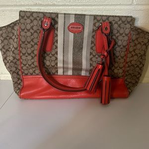 Orange and tan coach purse